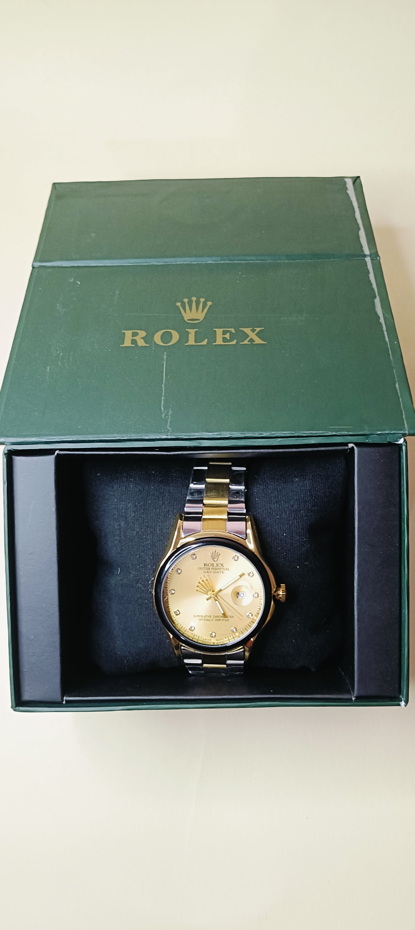 Rolex watch truetone with golden, black dial