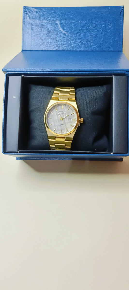 Tissot watch golden with white dial